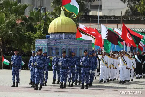 Palestinian members of officers display their skills during a graduation ceremony, in Gaza city, on March 6, 2016. Photo by Mohammed Asad