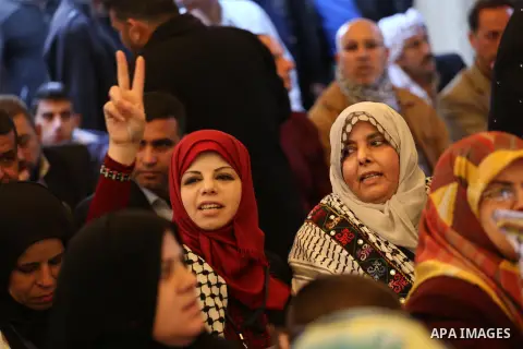 Palestinians take part in a protest demanding release the prisoners in Israeli jails, in front of Red cross office, in Gaza city, on March 7, 2016. Photo by Mohammed Asad