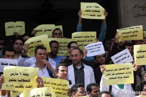 Egyptian Doctors take part in a protest to demanding their rights, in Cairo, Egypt, on March 9, 2016. Photo by Amr Sayed