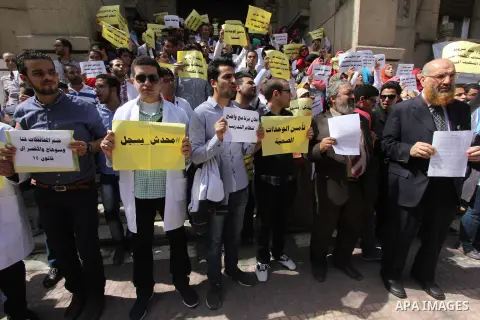 Egyptian Doctors take part in a protest to demanding their rights, in Cairo, Egypt, on March 9, 2016. Photo by Amr Sayed