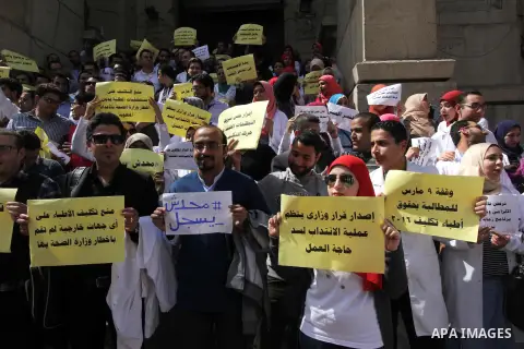 Egyptian Doctors take part in a protest to demanding their rights, in Cairo, Egypt, on March 9, 2016. Photo by Amr Sayed