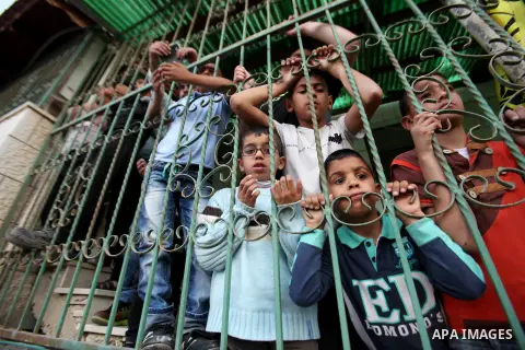 Relatives of Palestinian Ahmad Aamer, 16, who the Israeli military said was shot dead by Israeli soldiers after he tried to stab them mourn during his funeral in the West Bank village of Mas'ha near Salfit March 9, 2016....