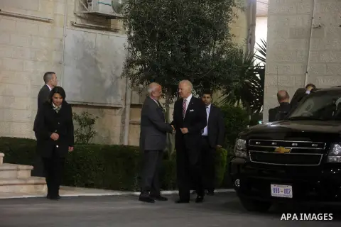 Palestinian negotiator Saeb Arekat (L) welcomes US Vice President Joe Biden (C) as he arrives to the Muqata, the Palestinian President Headquarters, in the West Bank town of Ramallah, 09 March 2016. Photo by Shadi Hatem