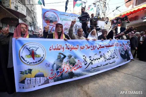 Palestinian supporters of the Islamic Jihad Movement take part in a demonstration in support of the second "intifada", or uprising, in 2000 on March 11, 2016 following the Friday prayers in Khan Yunis in the southern Gaz...