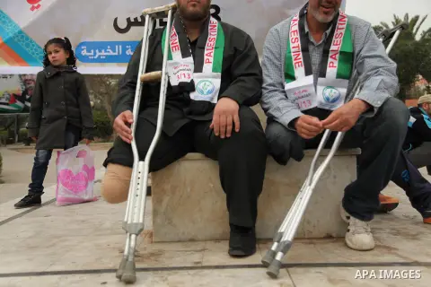 Palestinian Woundeds take part in a rally on the occasion of the Palestinian Wounded's Day in Gaza City on March 13, 2016. Photo by Ashraf Amra
