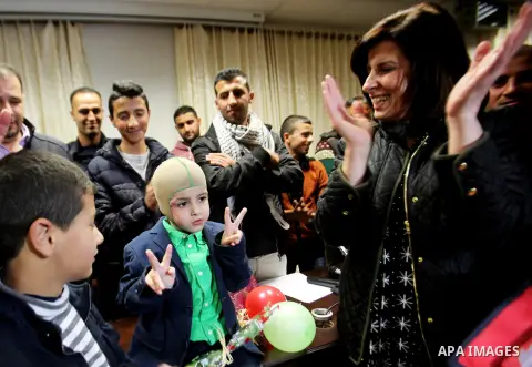 Five-year-old Ahmed Dawabsha, a Palestinian boy who survived a firebombing by Jewish extremists targeting his family home that killed his parents and brother, is seen before his meeting with the governor of the northern...