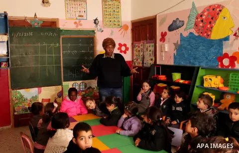 Salwa Sorour learns children inside a kindergarten in Gaza City, on March 16, 2016. 40-year-old Salwa Sorour is the only woman who drives a kindergarten mini-van to transport children in the Gaza Strip. The Palestinian C...