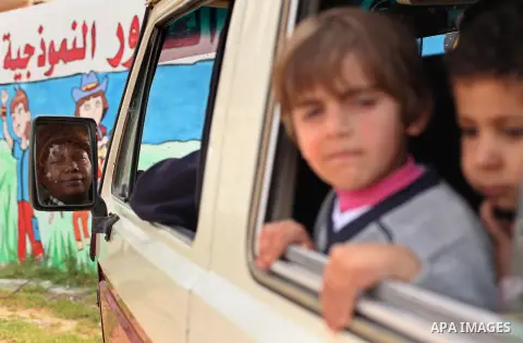 Salwa Sorour drives her mini-van in Gaza City on March 16, 2016. 40-year-old Salwa Sorour is the only woman who drives a kindergarten mini-van to transport children in the Gaza Strip. The Palestinian Central Bureau of St...