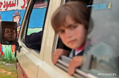 Salwa Sorour drives her mini-van in Gaza City on March 16, 2016. 40-year-old Salwa Sorour is the only woman who drives a kindergarten mini-van to transport children in the Gaza Strip. The Palestinian Central Bureau of St...