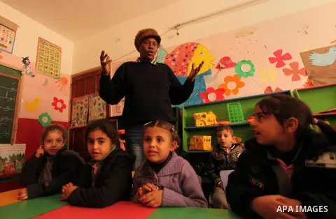 Salwa Sorour learns children inside a kindergarten in Gaza City, on March 16, 2016. 40-year-old Salwa Sorour is the only woman who drives a kindergarten mini-van to transport children in the Gaza Strip. The Palestinian C...