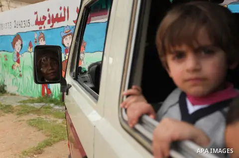 Salwa Sorour drives her mini-van in Gaza City on March 16, 2016. 40-year-old Salwa Sorour is the only woman who drives a kindergarten mini-van to transport children in the Gaza Strip. The Palestinian Central Bureau of St...