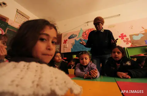 Salwa Sorour learns children inside a kindergarten in Gaza City, on March 16, 2016. 40-year-old Salwa Sorour is the only woman who drives a kindergarten mini-van to transport children in the Gaza Strip. The Palestinian C...