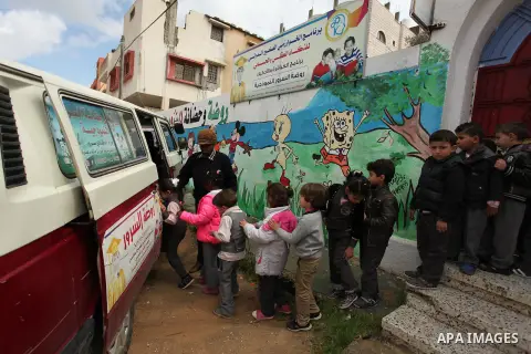 Salwa Sorour drives her mini-van in Gaza City on March 16, 2016. 40-year-old Salwa Sorour is the only woman who drives a kindergarten mini-van to transport children in the Gaza Strip. The Palestinian Central Bureau of St...