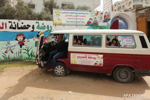 Salwa Sorour drives her mini-van in Gaza City on March 16, 2016. 40-year-old Salwa Sorour is the only woman who drives a kindergarten mini-van to transport children in the Gaza Strip. The Palestinian Central Bureau of St...