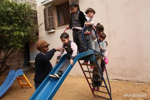 Salwa Sorour plays with children inside a kindergarten in Gaza City, on March 16, 2016. 40-year-old Salwa Sorour is the only woman who drives a kindergarten mini-van to transport children in the Gaza Strip. The Palestini...