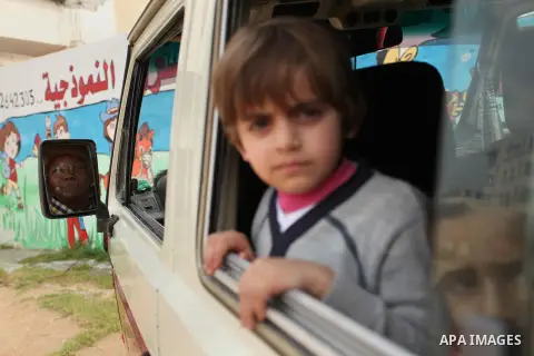 Salwa Sorour drives her mini-van in Gaza City on March 16, 2016. 40-year-old Salwa Sorour is the only woman who drives a kindergarten mini-van to transport children in the Gaza Strip. The Palestinian Central Bureau of St...