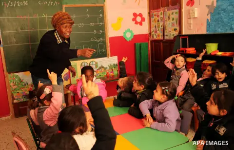 Salwa Sorour learns children inside a kindergarten in Gaza City, on March 16, 2016. 40-year-old Salwa Sorour is the only woman who drives a kindergarten mini-van to transport children in the Gaza Strip. The Palestinian C...