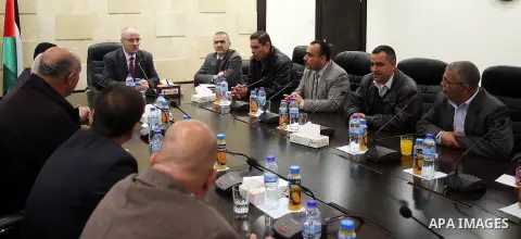 Palestinian Prime Minister Rami Hamdallah meets with the new members of the general secretariat of the union of teachers in the West Bank city of Ramallah on March 16, 2016. Photo by Prime Minister Office