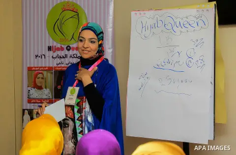Egyptian girls take part in a competition hijab queen, in Cairo, on March 19, 2016. Photo by Amr Sayed