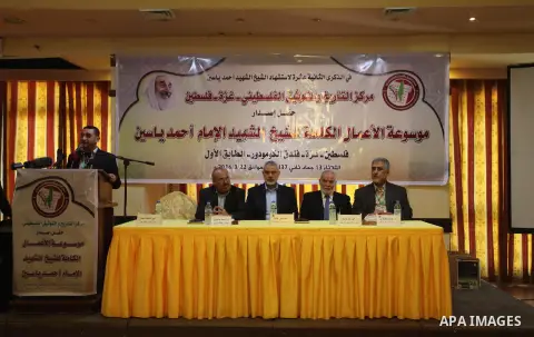 Senior Hamas leader Ismail Haniya attends a ceremony Book sinning for Hamas founder the martyr, Ahmed Yaseen in 12th anniversary for his assassination in Gaza City on March 22, 2016. Photo by Ashraf Amra
