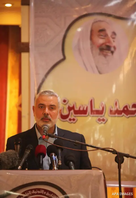 Senior Hamas leader Ismail Haniya attends a ceremony Book sinning for Hamas founder the martyr, Ahmed Yaseen in 12th anniversary for his assassination in Gaza City on March 22, 2016. Photo by Ashraf Amra
