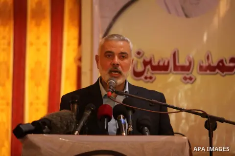 Senior Hamas leader Ismail Haniya attends a ceremony Book sinning for Hamas founder the martyr, Ahmed Yaseen in 12th anniversary for his assassination in Gaza City on March 22, 2016. Photo by Ashraf Amra