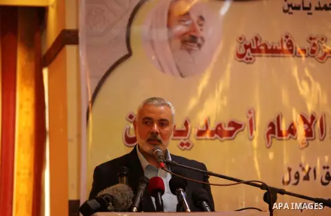 Senior Hamas leader Ismail Haniya attends a ceremony Book sinning for Hamas founder the martyr, Ahmed Yaseen in 12th anniversary for his assassination in Gaza City on March 22, 2016. Photo by Ashraf Amra