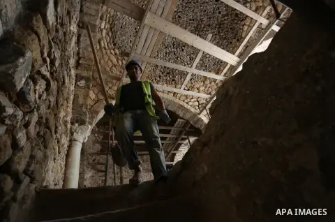 A Palestinian worker renovates the archaeological Maqam Al-Khader, in Deir al-Balah, central Gaza on March 24, 2016. Maqam Al-Kader is one of the monuments of the city of Deir al-Balah, the Ministry of Tourism and Antiqu...