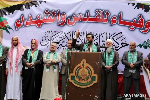 Mushir Al Masri, a Hamas MP and media spokesman speaks during a rally to mark the 12th anniversary of the death of assassinated Hamas spiritual leader Sheikh Ahmed Yassine and show solidarity with Palestinians in Jerusal...