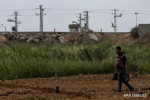 Palestinians plant olive trees during a march to mark Land Day in Gaza, on March 29, 2016. The annual demonstrations mark the deaths of six Arab Israeli protesters at the hands of Israeli police and troops during mass pr...