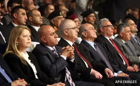 Palestinian Prime Minister Rami Hamdallah attends the Ceremony of Palestine International Award for Excellence and Creativity at al-Najah University, in the West Bank city of Nablus on March 29, 2016. Photo by Prime Mini...