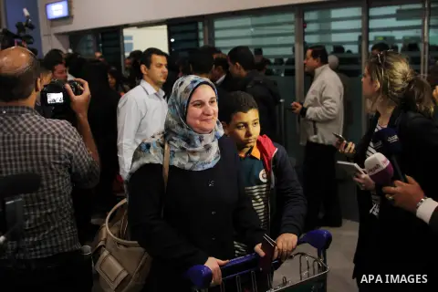 Passengers of an EgyptAir Airbus A-320 which was hijacked to Cypress arrive at Cairo international airport on March 29, 2016. An Egyptian man who hijacked an EgyptAir passenger plane and forced it to divert to Cyprus dem...