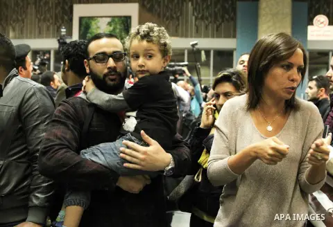 Passengers of an EgyptAir Airbus A-320 which was hijacked to Cypress arrive at Cairo international airport on March 29, 2016. An Egyptian man who hijacked an EgyptAir passenger plane and forced it to divert to Cyprus dem...