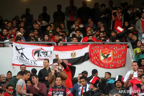 Egyptian fans watch the African Cup of Nations group G qualification football match between Egypt and Nigeria at the Borg el-Arab Stadium in Alexandria on March 29, 2016. Photo by Stringer