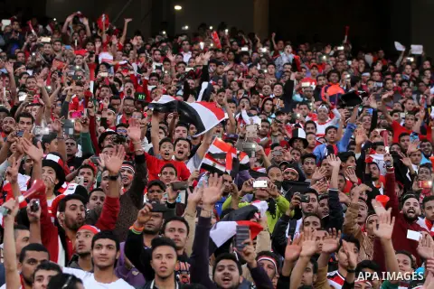 Egyptian fans watch the African Cup of Nations group G qualification football match between Egypt and Nigeria at the Borg el-Arab Stadium in Alexandria on March 29, 2016. Photo by Stringer