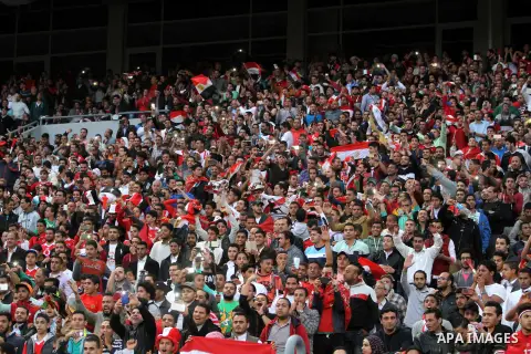 Egyptian fans watch the African Cup of Nations group G qualification football match between Egypt and Nigeria at the Borg el-Arab Stadium in Alexandria on March 29, 2016. Photo by Stringer
