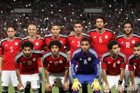 Egyptian players and Nigerian players compete during their African Cup of Nations group G qualification football match between Egypt and Nigeria at the Borg el-Arab Stadium in Alexandria on March 29, 2016. Photo by Strin...