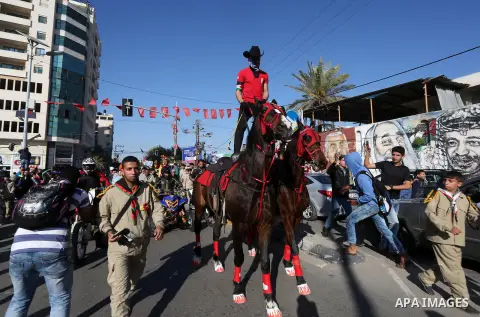 Palestinians participate in a cultural carnival organized by Gaza Municipality in Gaza City April 1, 2016. Photo by Mohammed Asad