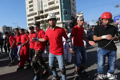 Palestinians participate in a cultural carnival organized by Gaza Municipality in Gaza City April 1, 2016. Photo by Mohammed Asad