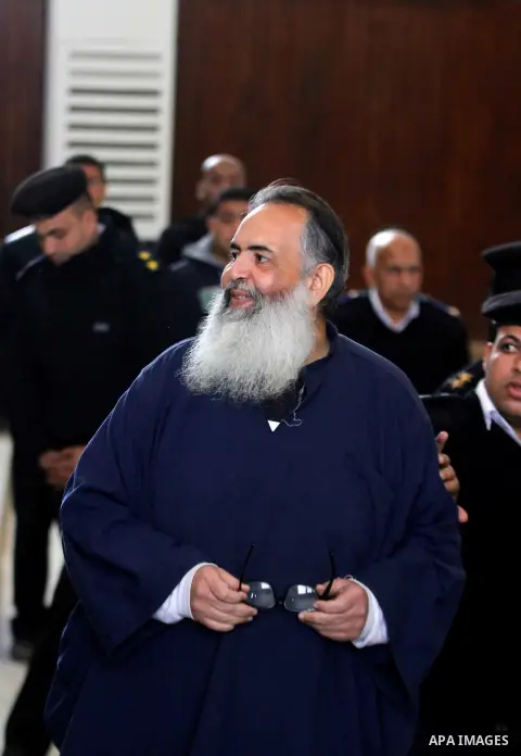 Egypt's Salafi leader and former presidential candidate Hazem Salah Abu Ismail attends his trial in Cairo on April 2, 2016. An egyptian court considers today, Saturday the first trial session of Salafist preacher Hazem S...