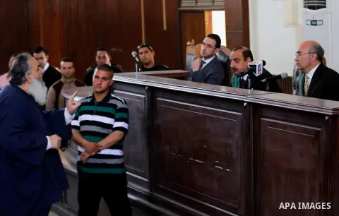 Egypt's Salafi leader and former presidential candidate Hazem Salah Abu Ismail attends his trial in Cairo on April 2, 2016. An egyptian court considers today, Saturday the first trial session of Salafist preacher Hazem S...