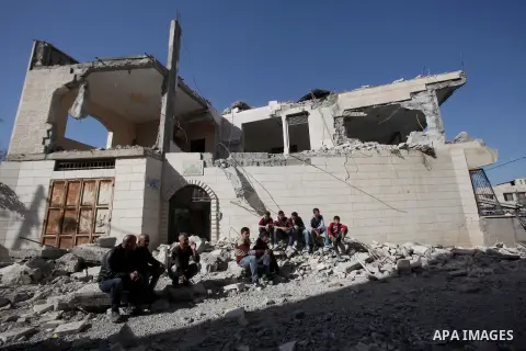 Palestinians inspect the rubble of of their house that were demolished by the Israeli bulldozers, in the village of Qabatiya south of Jenin, on April 4, 2016. The three Palestinians to whom the houses belonged were shot...
