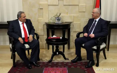 Palestinian Prime Minister, Rami Hamdallah, meet with, Constitutional Court Chairman Alhaji Mohammed Qasim, in the West Bank city of Ramallah, on April 7, 2016. Photo by Prime Minister Office