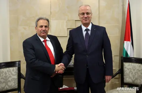 Palestinian Prime Minister, Rami Hamdallah, meet with, Constitutional Court Chairman Alhaji Mohammed Qasim, in the West Bank city of Ramallah, on April 7, 2016. Photo by Prime Minister Office