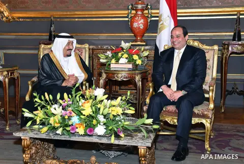 A handout picture released by the Egyptian Presidency on April 10, 2016 shows Egyptian President Abdel Fattah al-Sisi meeting with Saudi King Salman bin Abdulaziz as part of a signing ceremony for bilateral aggrements at...