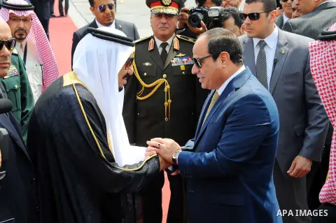 Saudi King Salman shake hands with Egyptian President Abdel Fattah al-Sisi before leaving Cairo's international airport on April 11, 2016. Photo by Egyptian President Office
