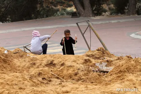 Palestinian children inspect the damage to a children's garden after it was demolished by Israeli troops in the village of Za'tara near the West Bank city of Nablus, Tuesday, April 12, 2016. Israeli forces demolished the...
