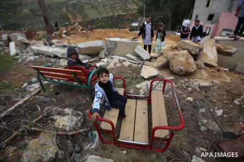 Palestinian children inspect the damage to a children's garden after it was demolished by Israeli troops in the village of Za'tara near the West Bank city of Nablus, Tuesday, April 12, 2016. Israeli forces demolished the...