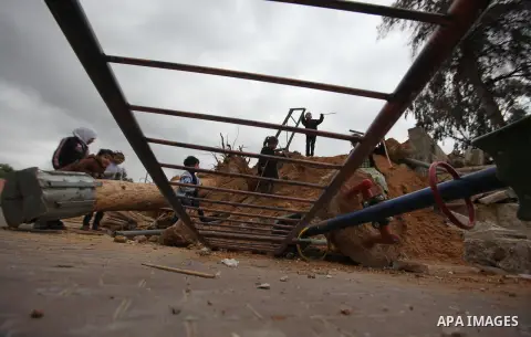 Palestinian children inspect the damage to a children's garden after it was demolished by Israeli troops in the village of Za'tara near the West Bank city of Nablus, Tuesday, April 12, 2016. Israeli forces demolished the...