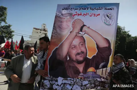 Palestinians take part during a rally marking Palestinian Prisoner Day in Gaza City on April 17, 2016. Photo by Mohammed Asad